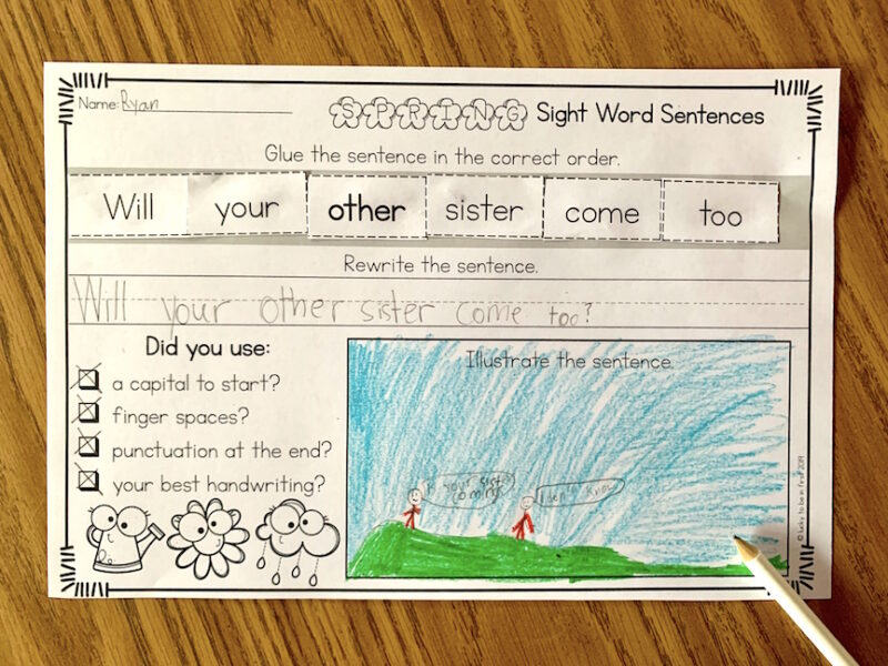 a student using a spring themed fry sight word sentence activity in the classroom | Lucky Learning with Molly Lynch