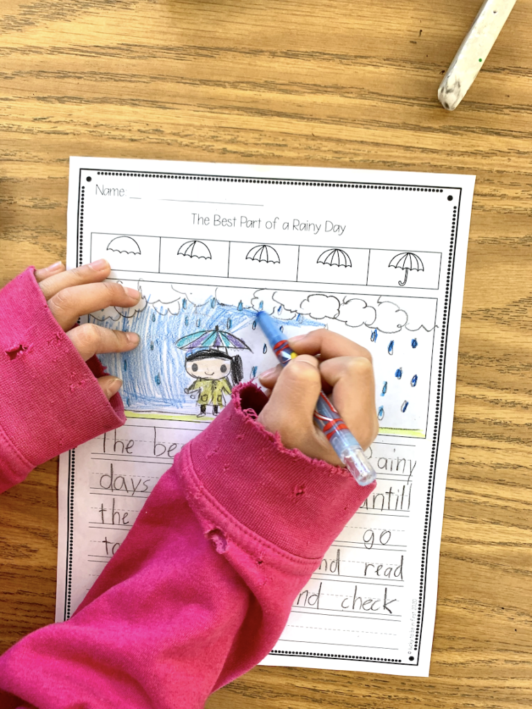 a first grader using a writing prompt worksheet about spring | Lucky Learning with Molly Lynch