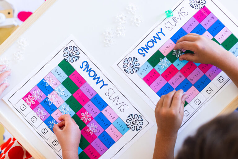 snowy sums game with snowflake pieces for a math center in a classroom | Lucky Learning with Molly Lynch